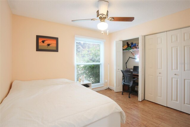 bedroom with ceiling fan and light wood-type flooring