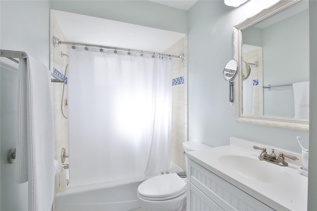 full bathroom featuring vanity, toilet, and shower / bath combo with shower curtain