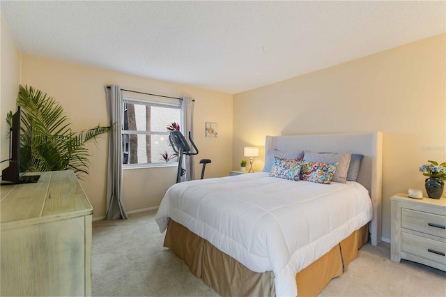 bedroom featuring light carpet