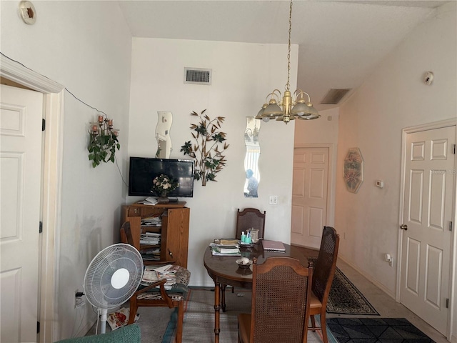 dining room featuring a notable chandelier