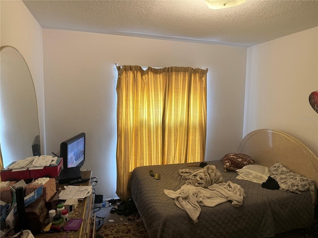 bedroom with a textured ceiling