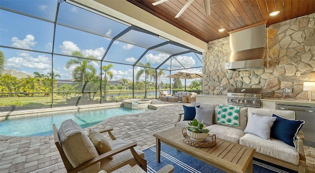 view of patio featuring grilling area, exterior kitchen, a lanai, a pool with hot tub, and an outdoor living space