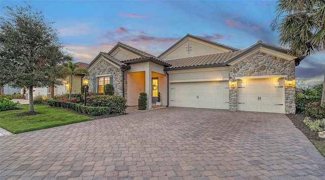 view of front of home with a garage