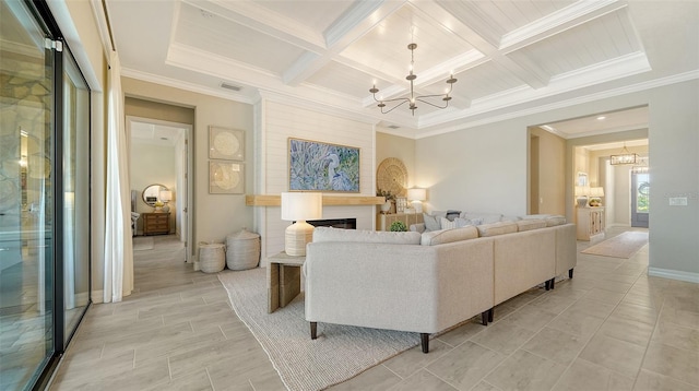 living room featuring coffered ceiling, an inviting chandelier, beam ceiling, and ornamental molding