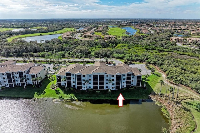 bird's eye view with a water view