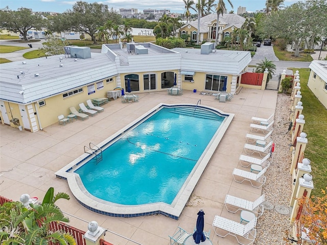 view of pool featuring a patio area