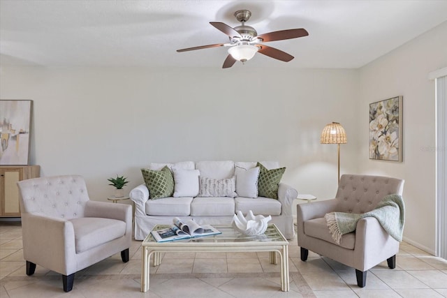 living room featuring light tile patterned flooring and ceiling fan