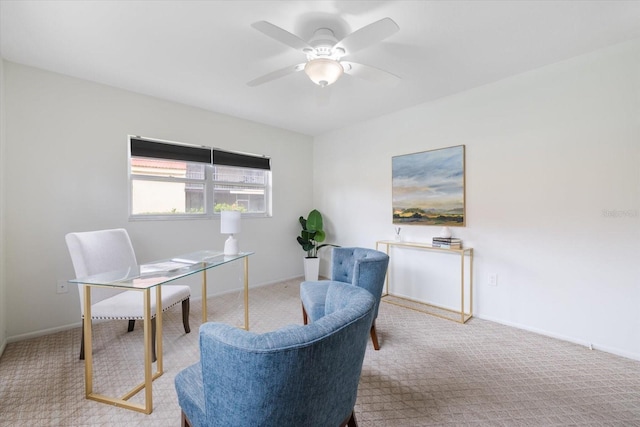 home office with ceiling fan, carpet flooring, and baseboards