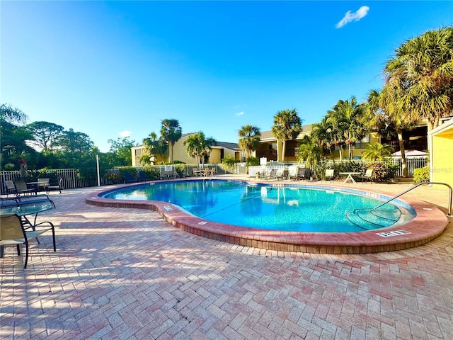 view of pool featuring a patio area