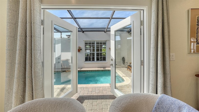 doorway to outside featuring plenty of natural light