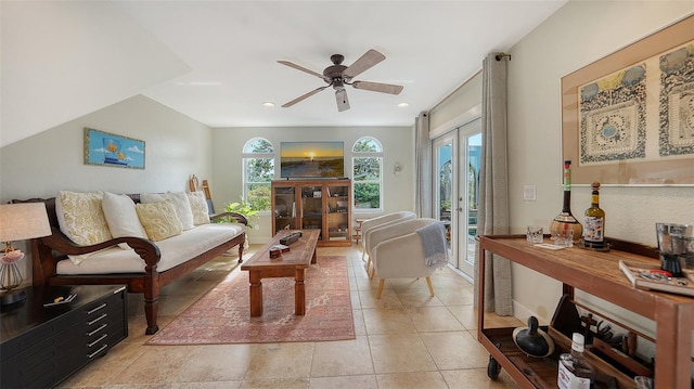 interior space with ceiling fan and french doors