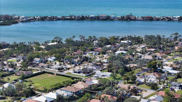 bird's eye view with a water view