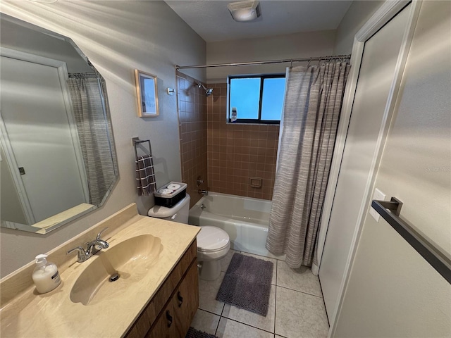 full bathroom with tile patterned flooring, shower / tub combo, vanity, and toilet