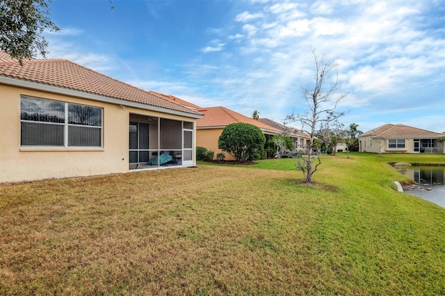 view of yard with a sunroom