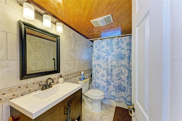 bathroom featuring tile patterned floors, wooden ceiling, tile walls, and toilet