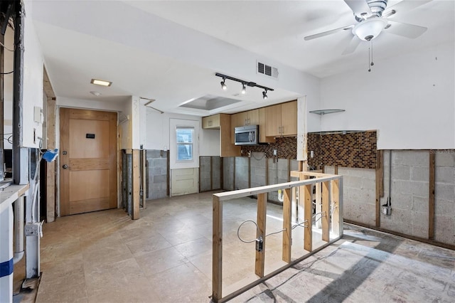 kitchen featuring ceiling fan