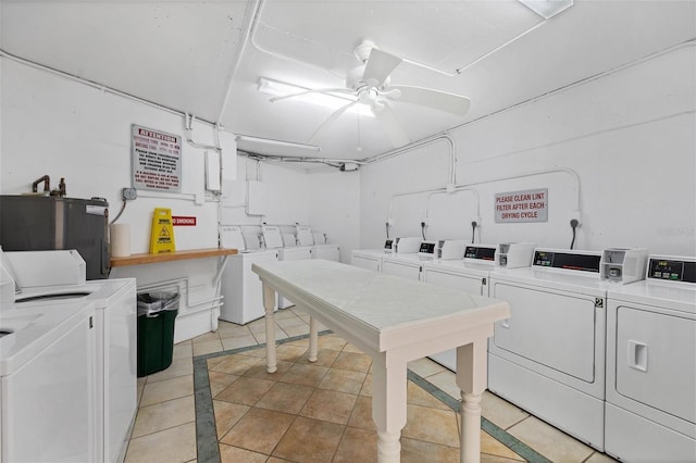 washroom with light tile patterned floors, separate washer and dryer, and ceiling fan