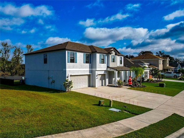 view of front of house featuring a front yard and a garage