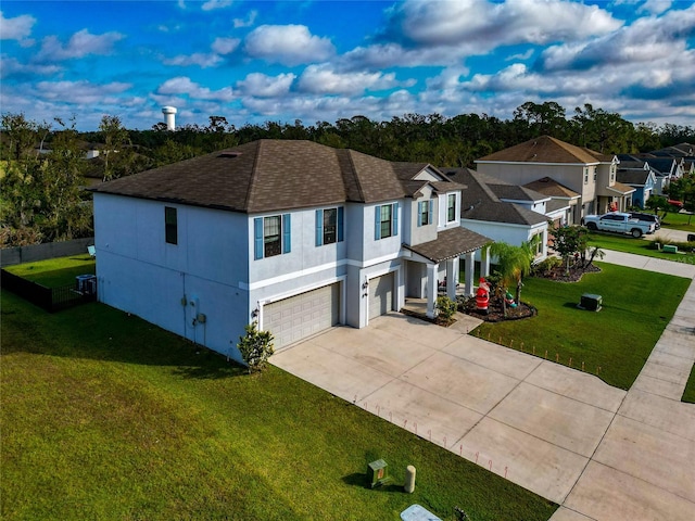 ranch-style home with a front yard and a garage