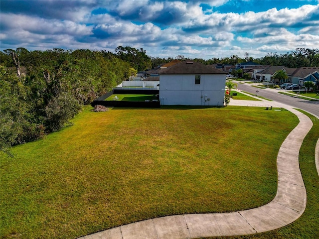 exterior space with a yard