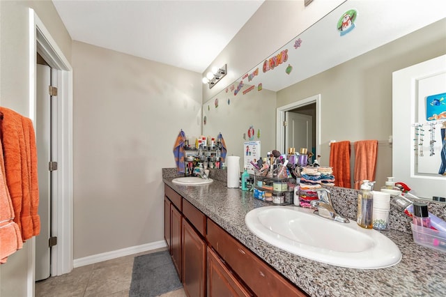 bathroom featuring tile patterned floors and vanity