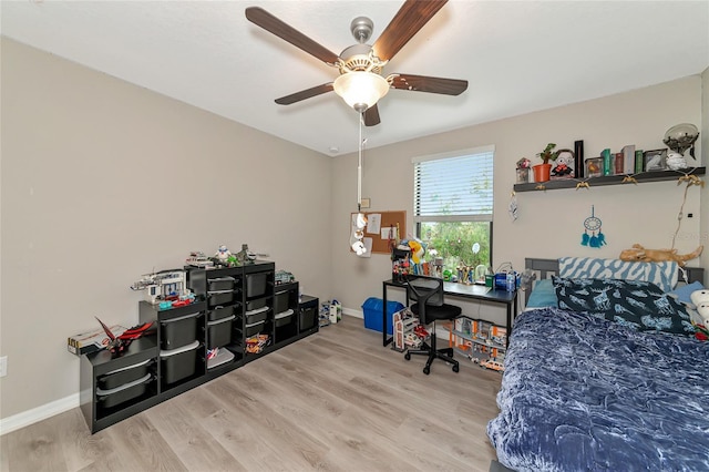 bedroom featuring ceiling fan and light wood-type flooring