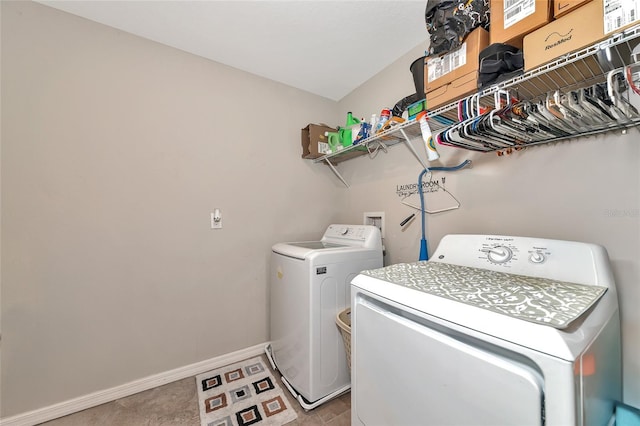 laundry room with independent washer and dryer