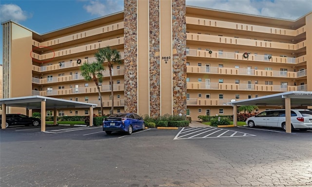 3640 Ironwood Cir Unit 601N, Bradenton, FL 34209 - view of apartment building / complex featuring covered and uncovered parking