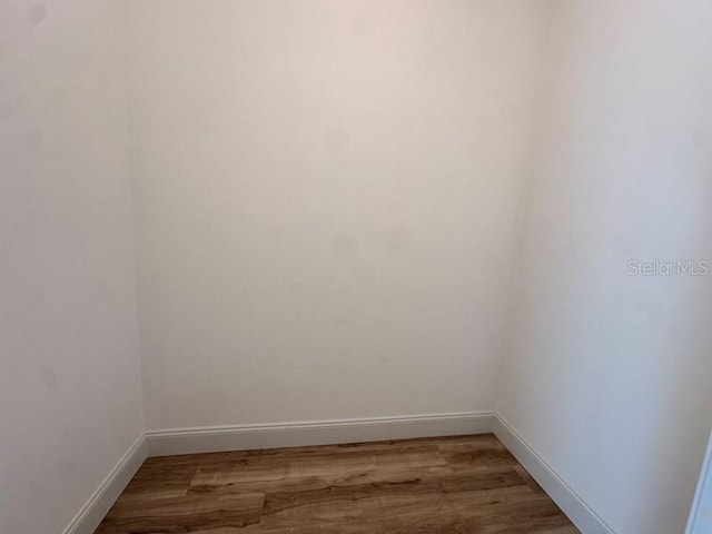 empty room featuring hardwood / wood-style flooring