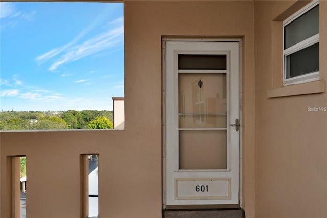 3640 Ironwood Cir Unit 601N, Bradenton, FL 34209 - doorway to property featuring stucco siding