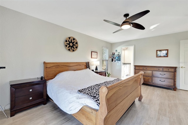 bedroom with ceiling fan and light wood-type flooring