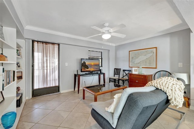 tiled living room featuring ceiling fan, crown molding, and built in shelves