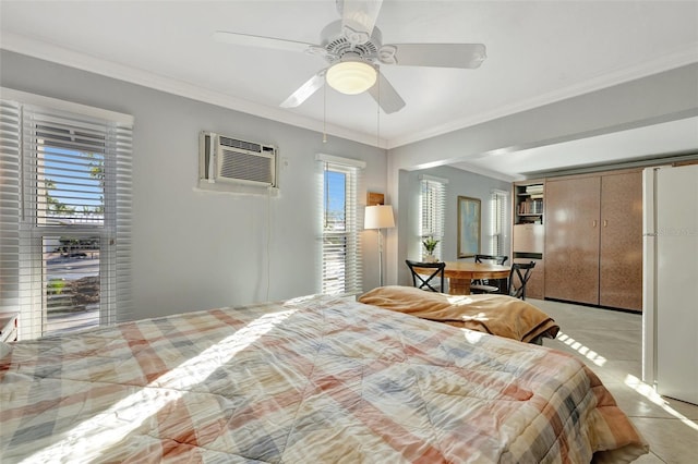 bedroom with ornamental molding, ceiling fan, light tile patterned floors, white refrigerator, and an AC wall unit