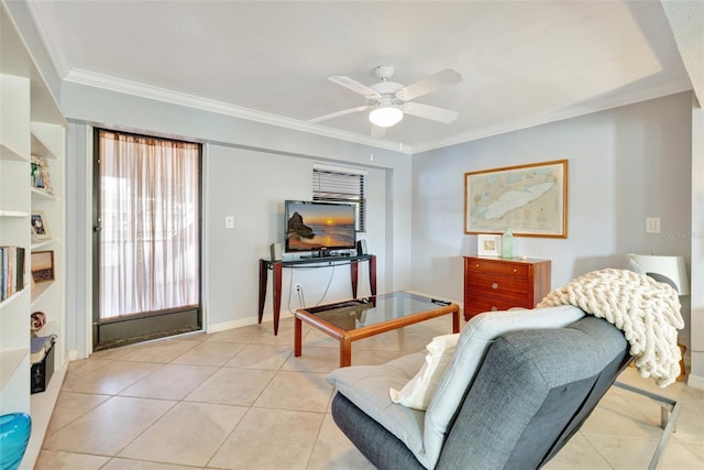 living room with ceiling fan, crown molding, and light tile patterned floors