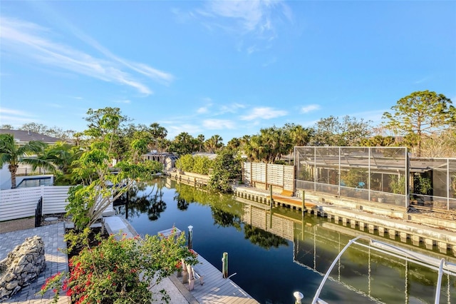 dock area with a water view