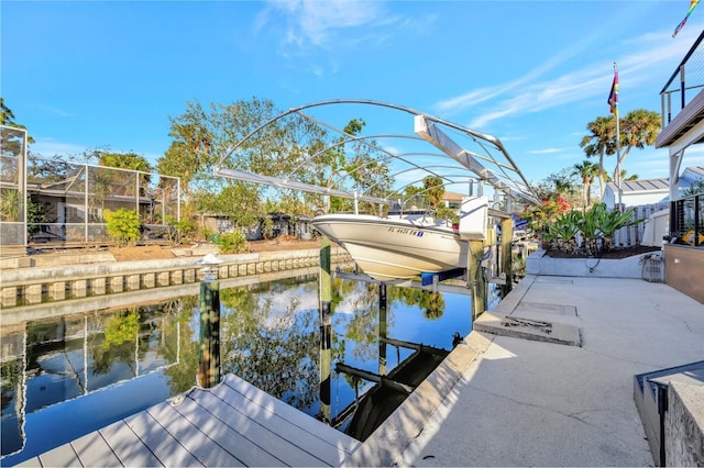 dock area with a water view