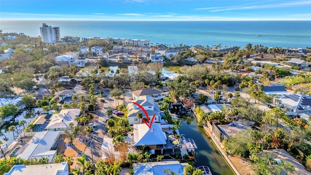 drone / aerial view featuring a water view