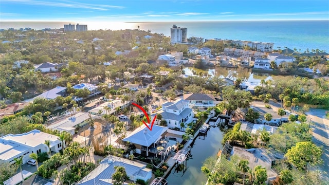 bird's eye view with a water view