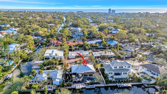 drone / aerial view featuring a water view