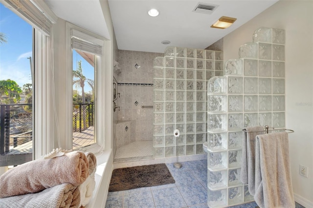 521 Cummings St, Sarasota, FL 34242 - full bath with tile patterned flooring, a walk in shower, and vaulted ceiling