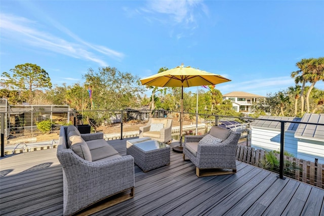 521 Cummings St, Sarasota, FL 34242 - wooden deck with an outdoor living space
