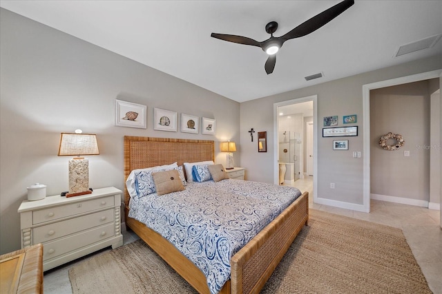 bedroom with ensuite bathroom and ceiling fan