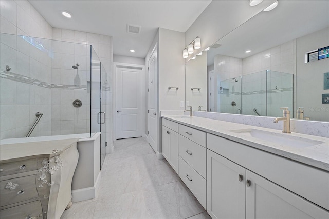 bathroom featuring vanity and walk in shower