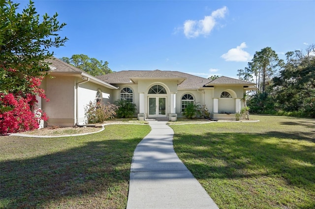 view of front of house with a front lawn