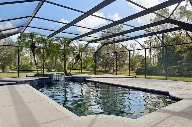 view of swimming pool featuring a patio area and a lanai