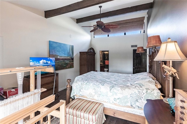 bedroom with ceiling fan, wood-type flooring, and beam ceiling