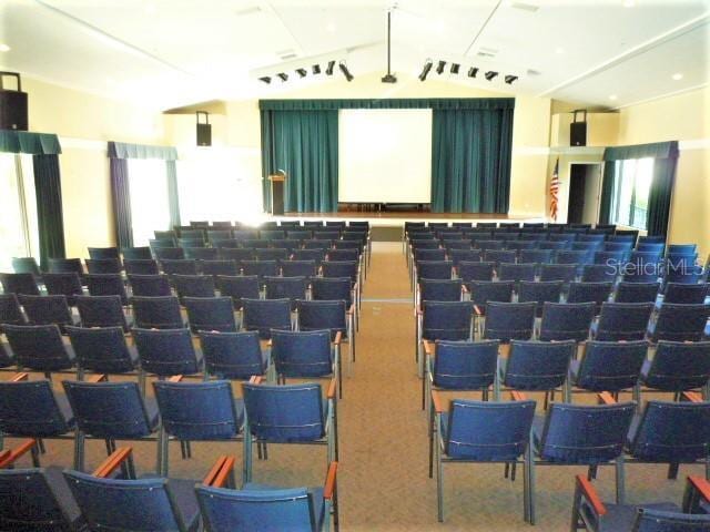 home theater featuring lofted ceiling