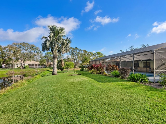 view of yard featuring a lanai