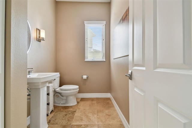 bathroom featuring toilet