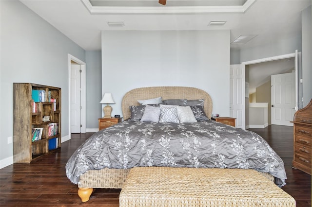 bedroom with dark hardwood / wood-style floors